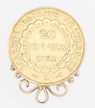 A 20 franc 1898 with 9ct gold mount