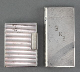 A lady's silver Dupont cigarette lighter, a gentleman's Calibri ditto 