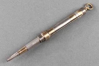 A silver plated gilt banded propelling pencil bearing the cypher of George V 