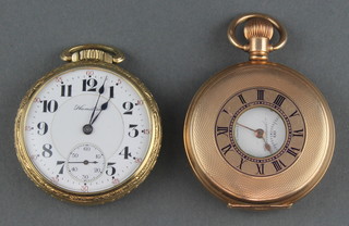 A gentleman's gold plated half hunter pocket watch with mechanical movement and seconds at 6 o'clock, an Art Deco gilt pocket watch 