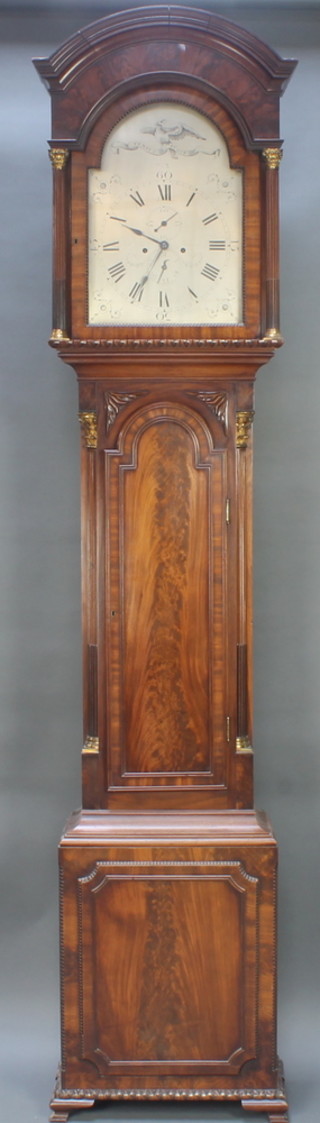 A George III 8 day striking longcase clock, the 14" silvered arched dial inscribed J Jew with subsidiary seconds and calendar dials, contained in a mahogany case, the door interior stamped  Stratford, 102"h 