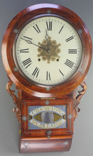 An American 8 day drop dial wall clock with 11 1/2" painted dial with Roman numerals, contained in a steel inlaid mahogany case, enclosed by a glass panelled door marked Champion Regulator, the back plate with label Superior 8 day clock 