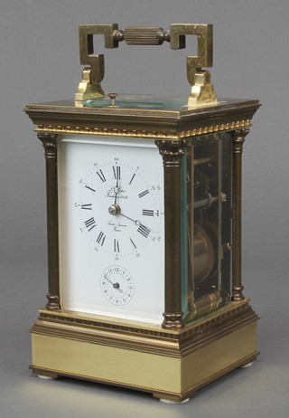 Sainte Suxanne, a 20th Century French repeating carriage alarm clock contained in a gilt metal case 6"h x 4"w x 3 1.2"d 