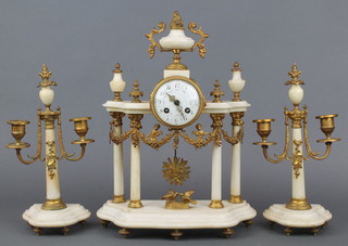 A French 19th Century gilt metal and onyx clock garniture the 8 day striking mantel clock with Arabic numerals contained in a Portico style case surmounted by a lidded urn decorated 2 doves, marked Daux Pigeons and a pair of twin light candelabrum 
