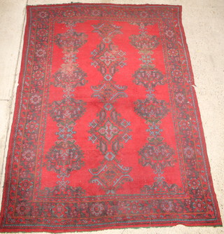 A red and blue ground Turkey carpet 135" x 100" 