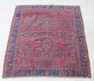 A red and blue ground Sarough rug 75" x 63 1/2" 