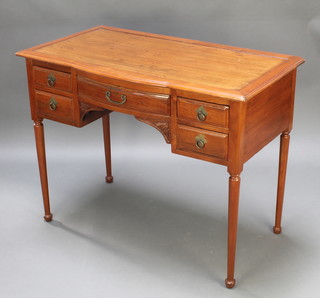An Oriental hardwood bow front writing table fitted 1 long and 4 short drawers raised on turned supports 31"h x 40"w x 21"d 