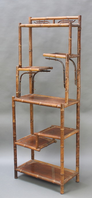 A bamboo 7 tier whatnot 72"h x 25 1/2"w x 14"d 