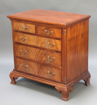 Brights of Nettlebed, a Georgian style mahogany chest of 2 short and 3 long drawers with brass swan neck drop handles and fluted columns to the sides, raised on ogee bracket feet 33"h x 31 1/2"w x 20"d 