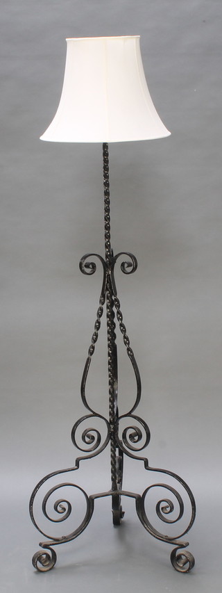 A black painted wrought iron standard lamp 60"h
