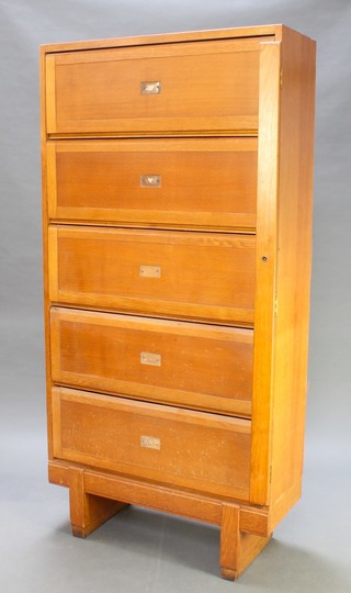 A pair of Art Deco style light oak 5 tier cabinets enclosed by fall fronts, the backs marked Sep 1958 ER "Staverion" FCB 62  and August 1956 ER "Staverion" FCB 62 73"h x 37"w x 15"d 

