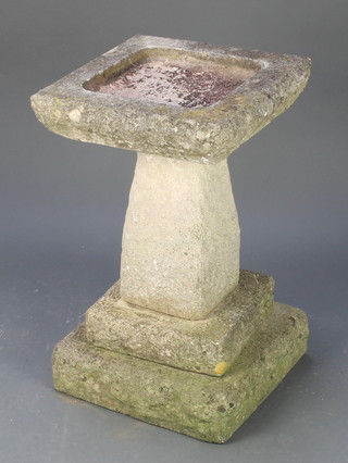 A square concrete garden bird bath raised on a stepped base 26"h x 16" x 16" 