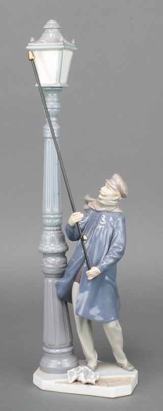 A Lladro figure of a gentleman lamp lighter 5205 19" 