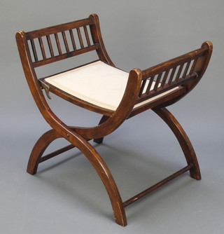 An Edwardian mahogany framed X framed folding stool 