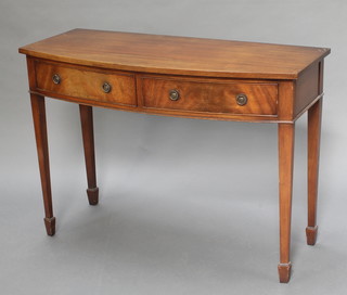 A Georgian style mahogany bow front side table fitted 2 drawers, raised on square tapering supports 30"h x 42"w x 18"d 