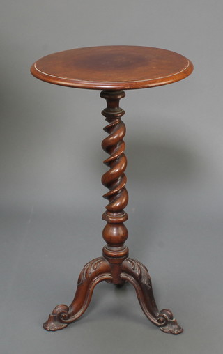 A Victorian circular mahogany wine table raised on spiral turned tripod base 28"h x 16"diam. 