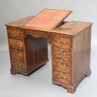 A Georgian mahogany "architects desk" with rectangular ratcheted centre section, the pedestals fitted 8 short drawers with replacement swan neck drop handles, raised on bracket feet 30"h x 41 1/2"w x 23 1/2"d 