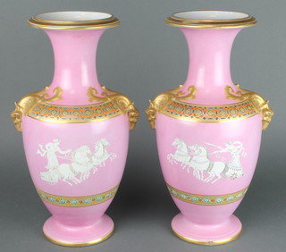 A pair of Victorian pink ground vases with classical decoration and gilt rams head handles 17" 