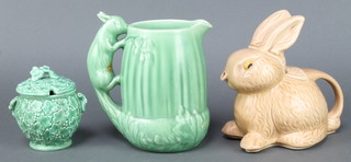 A Sylvac style teapot in the form of a rabbit 7", a jug with squirrel handle 1958 8" and a lidded pot 2046 4" 
