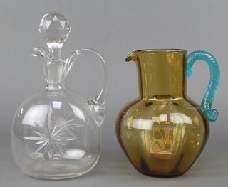 A Victorian 2 colour glass water jug 8" and a clear glass ewer and stopper 10" 