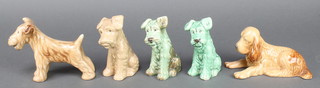 A Sylvac green terrier 1378 4 1/2", a do., a seated tan terrier 5", a standing ditto 4 1/2" and a reclining spaniel 6" 