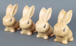 A Sylvac tan rabbit 1026 6 1/2" and 3 others