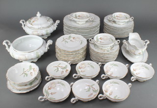 A Bavarian porcelain Sylvia pattern dinner service comprising ten 2 handled bowls, 11 saucers, 12 small plates, 11 medium plates, 9 large plates, tureen and cover, 1 tureen, a sauce boat and a dessert bowl 