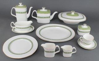 A Royal Doulton Rondelay HN 5004 pattern tea, coffee and dinner service comprising 12 tea cups, 10 saucers, teapot with lid, sugar bowl, milk jug, 2 tureens, sauce boat and stand, an oval meat plate, an oval platter, 2 cake plates, 12 small plates, 12 medium plates, 12 dinner plates, 11 dessert bowls, 12 coffee cups, 12 saucers, cream jug, sugar bowl, coffee pot with lid, bowl, 12 serial bowls, 11 saucers, 