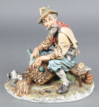 A Capodimonte figure of a seated workman with dog signed Bruno 8" 1/2