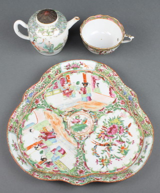 A late 19th Century Cantonese trefoil tray decorated with panels of figures and birds 11" together with a Cantonese tea cup and a famille verte teapot 