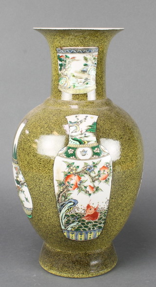 A Chinese 18th Century style green ground oviform vase decorated with vases 15" 