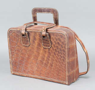 A lady's brown crocodile handbag 3" x 11" x 4" 