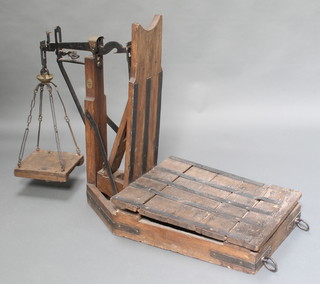 A pair of 19th Century elm and iron French platform scales 