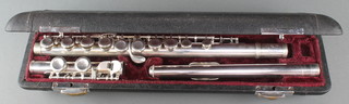 A Lark M4006 silver plated flute, cased 