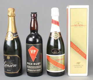 A bottle of Mumm Cordon Rouge champagne, a bottle of Lanson Black Label champagne and a bottle of "1953" VP Point Brand Rich Ruby grape juice
