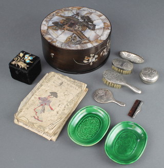 A Japanese cylindrical hardwood and inlaid mother of pearl trinket box 3" x 7" (sections of inlay missing to the edge) 2 Japanese linen books, an antimony dressing table set etc 