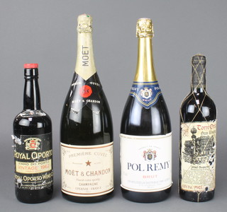 A Moet & Chandon 150cl magnum bottle of champagne, a  Pol Remy 150cl magnum bottle of champagne, a bottle of 1982 Royal Oporto port and a bottle of 1988 Torre Oria Grand Reserve  

