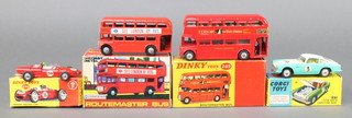 A Dinky model of a Ferrari racing car no.242 boxed (slight dent to box), a Dinky model of a Routemaster  bus no.289 boxed, a Corgi model of an Aston Martin Competition model no.309 and a Lonestar model of a Routemaster bust no.1259 