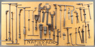 A collection of 41 tools mounted on a board marked Napier Aero Engine Kit, some pieces marked and numbered, mounted on a wooden board 