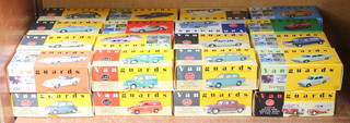 32 Vanguard models of vintage vehicles 
