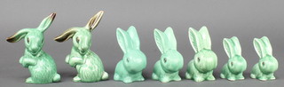 2 Beswick green rabbits sitting on their haunches 1302 6" and 5 other green glazed rabbits