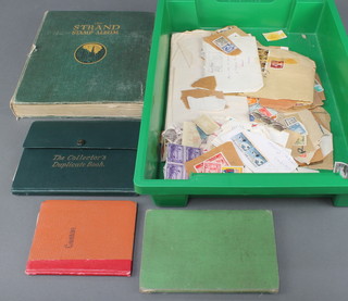 A green album of mint and used World stamps, 3 small stock books of World stamps and loose stamps 