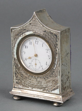 An Edwardian silver engine turned bedroom timepiece on ball feet 3 1/2" Birmingham 1910 