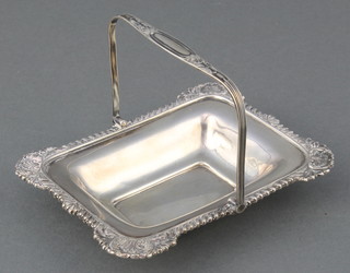 An Edwardian silver novelty bon bon dish in the form of a miniature swing handled basket Birmingham 1910 Maker Hukin & Heath 68 grams 