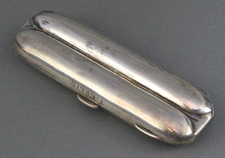 An Edwardian silver double torpedo cigar case Birmingham 1904, Maker William Hair Haseler 83 ozs gross, 5 1/4" 