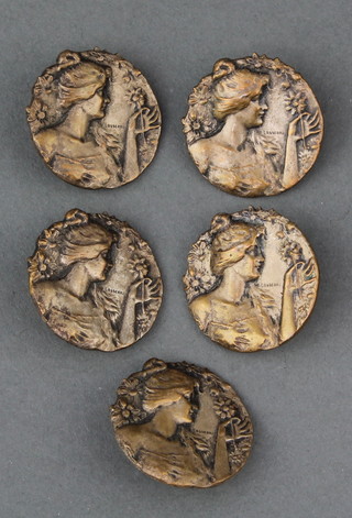 A set of 5 Art Nouveau silver plated buttons decorated with ladies 