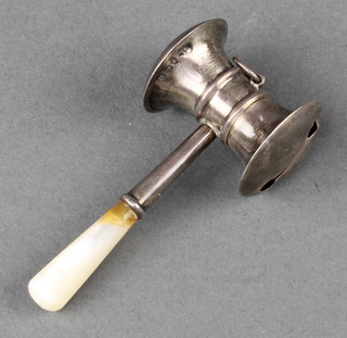 A silver rattle in the form of a gavel with mother of pearl handle Birmingham 1939 