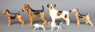 A Royal Doulton figure of an Airedale Terrier 5 1/2" and 5 other figures of dogs