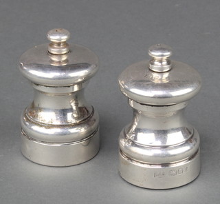 A pair of silver salt and pepper mills 3" 