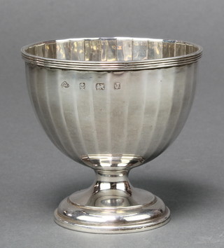 A silver pedestal sugar bowl with panelled body Birmingham 1933, 94 grams